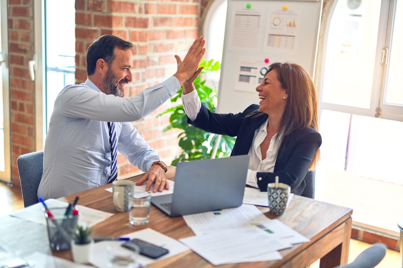 Professionals collaborating in a well-lit workplace